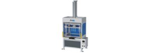 Stamping and trimming machine