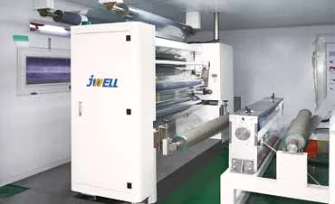 White JWELL coating unit processing clear film in a cleanroom