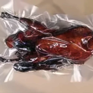 Vacuum-packed roast poultry in a clear plastic bag